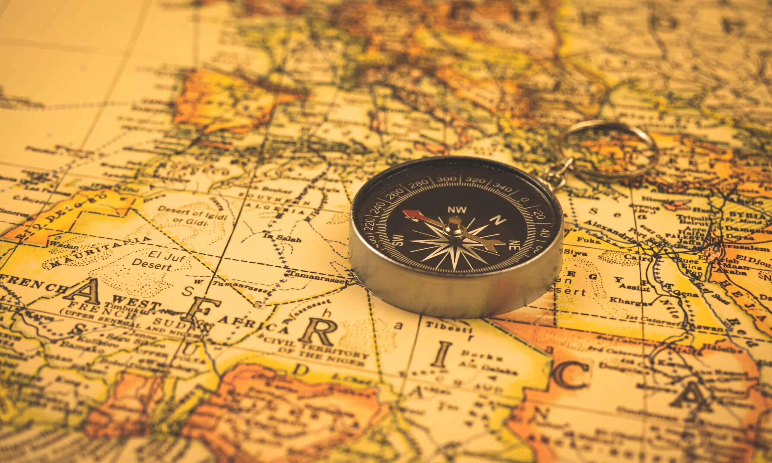 Antique Compass On Vintage Africa Map 1 Scaled (1)